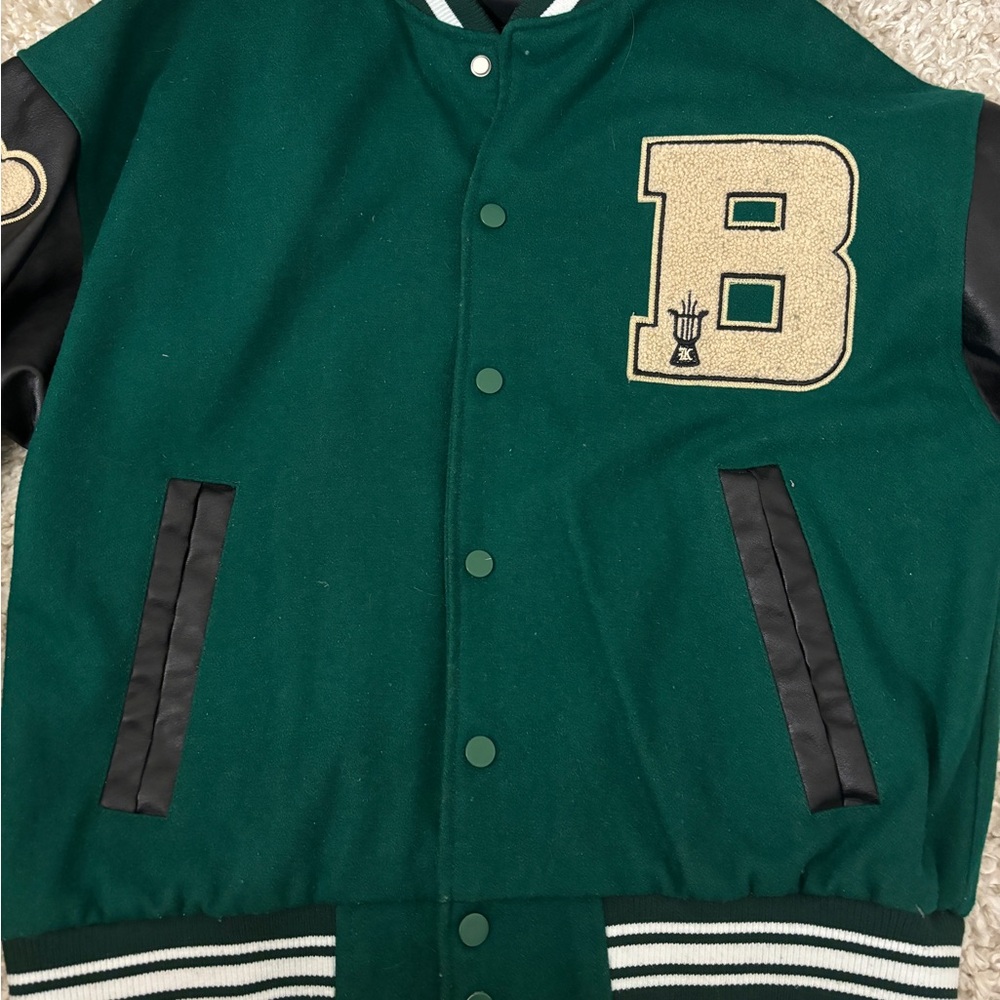 green varsity jacket